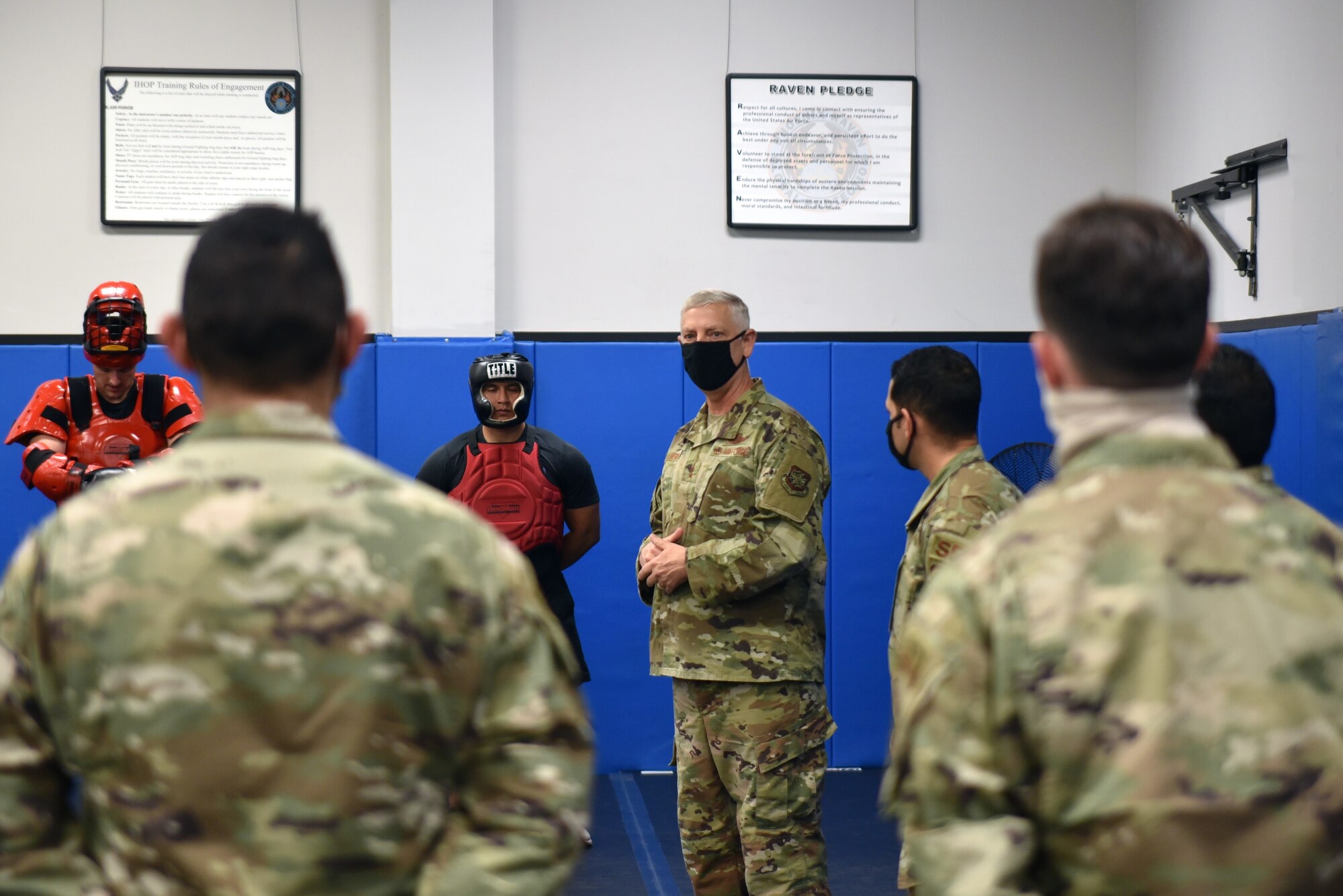 Tech. Sgt. Gabriel Rosario, Non-commissioned Officer in Charge of the Phoenix Raven Qualification Course, 421st Combat Training Squadron, provides an overview of the Phoenix Raven Qualification Course to Maj. Gen. Mark Camerer, U.S. Air Force Expeditionary Center commander, during his immersion tour with the U.S. Air Force Expeditionary Operations School at Joint Base McGuire-Dix-Lakehurst, New Jersey on Oct. 20, 2020. The tour allowed Camerer to interact with Airmen, get to know them, and hear how they contribute to the USAFEC, Air Mobility Command, and Air Force missions. (U.S. Air Force photo by Maj. George Tobias)