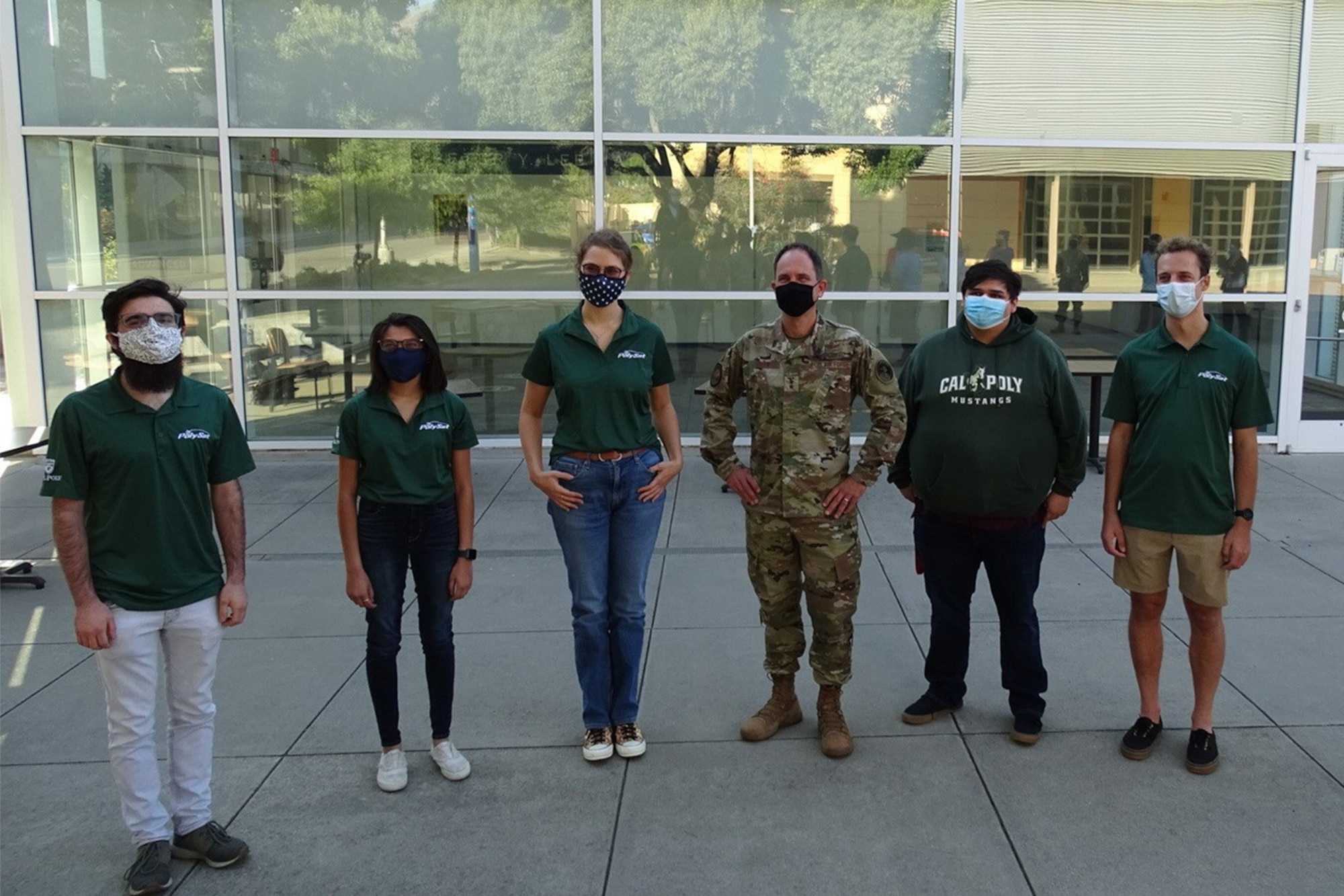 Photo of Maj. Gen. John Shaw meeting Cal Poly CubeSat Lab program students.