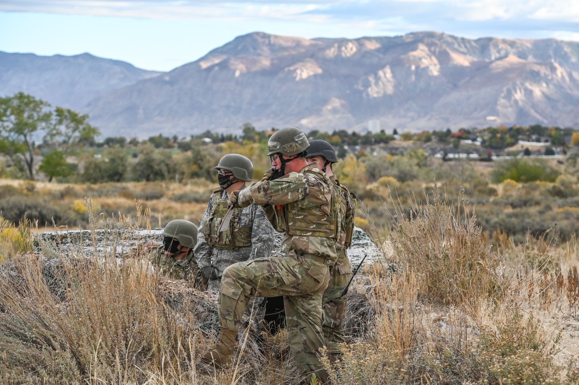 Airmen practice radio communications during a Deployment Initial Readiness Training, or DIRT, exercise Oct. 22, 2020, at Hill Air Force Base, Utah. Airmen from 729th Air Control Squadron, along with their sister unit 726th ACS from Mountain Home, Idaho, participated in the 48-hour training exercise where they were taught deployment readiness skills. (U.S. Air Force photo by Cynthia Griggs)