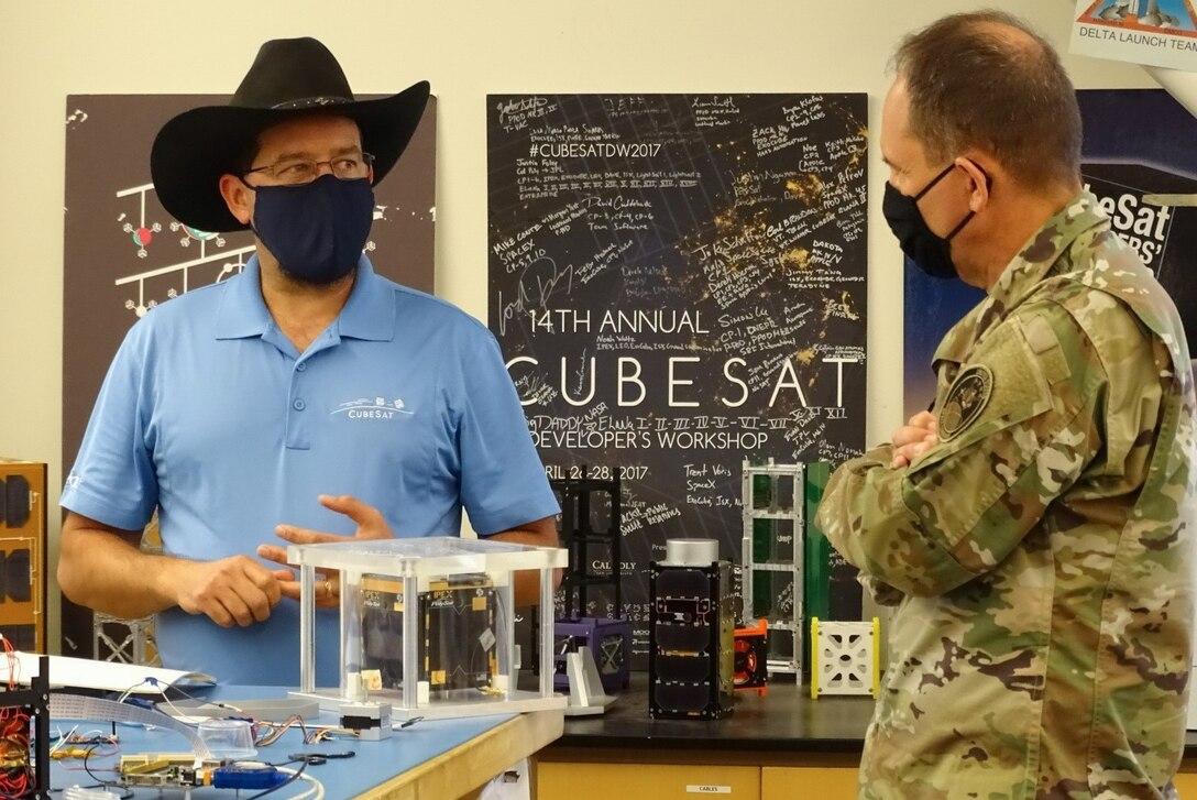Photo of Maj. Gen. John Shaw visiting Cal Poly CubeSat Lab program.