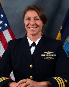 Official portrait of Cmdr. Cayanne “Peppers” McFarlane, the executive officer of Naval Computer and Telecommunications Station, Sicily.