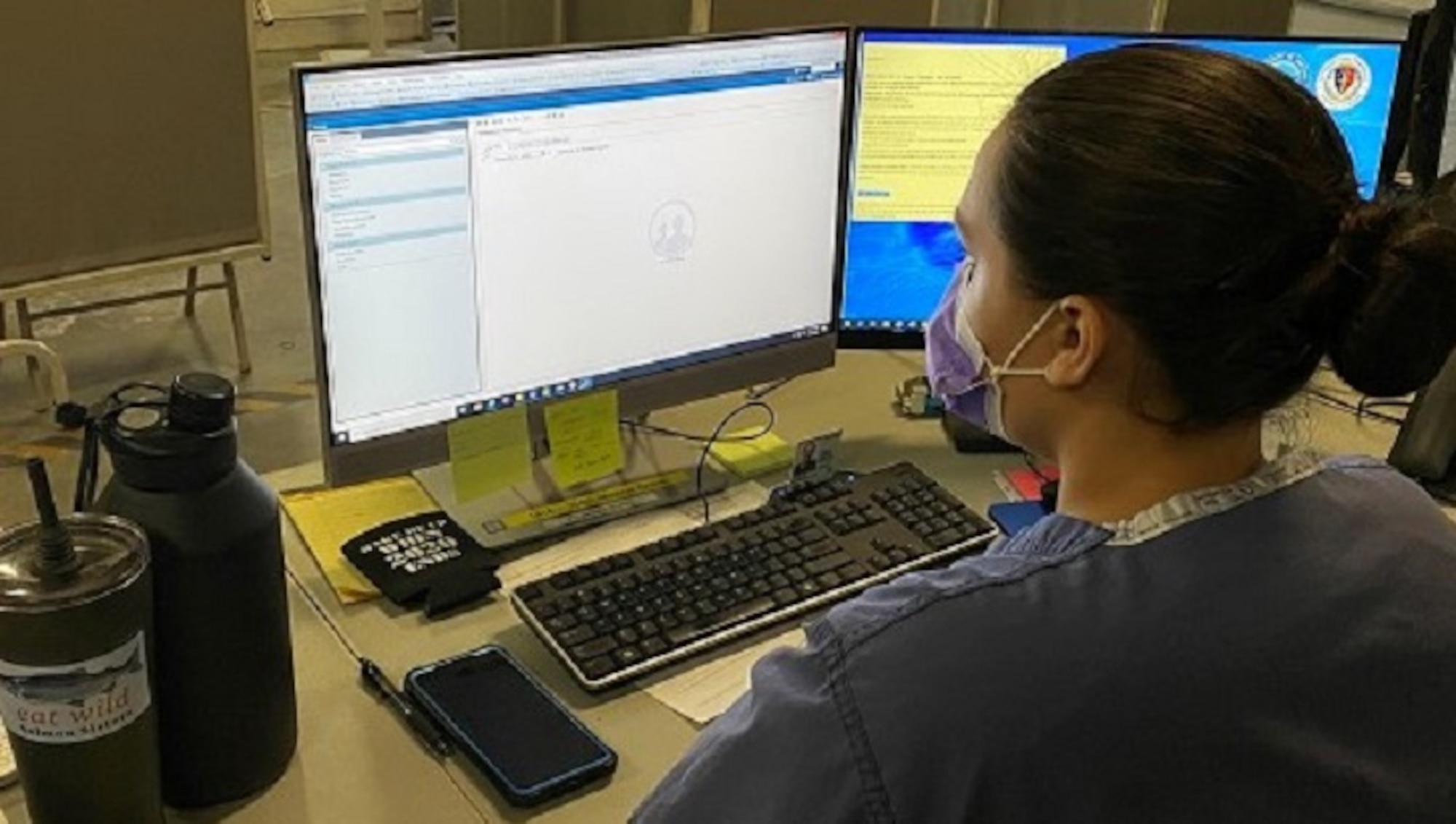 Image of Airman working on a computer.