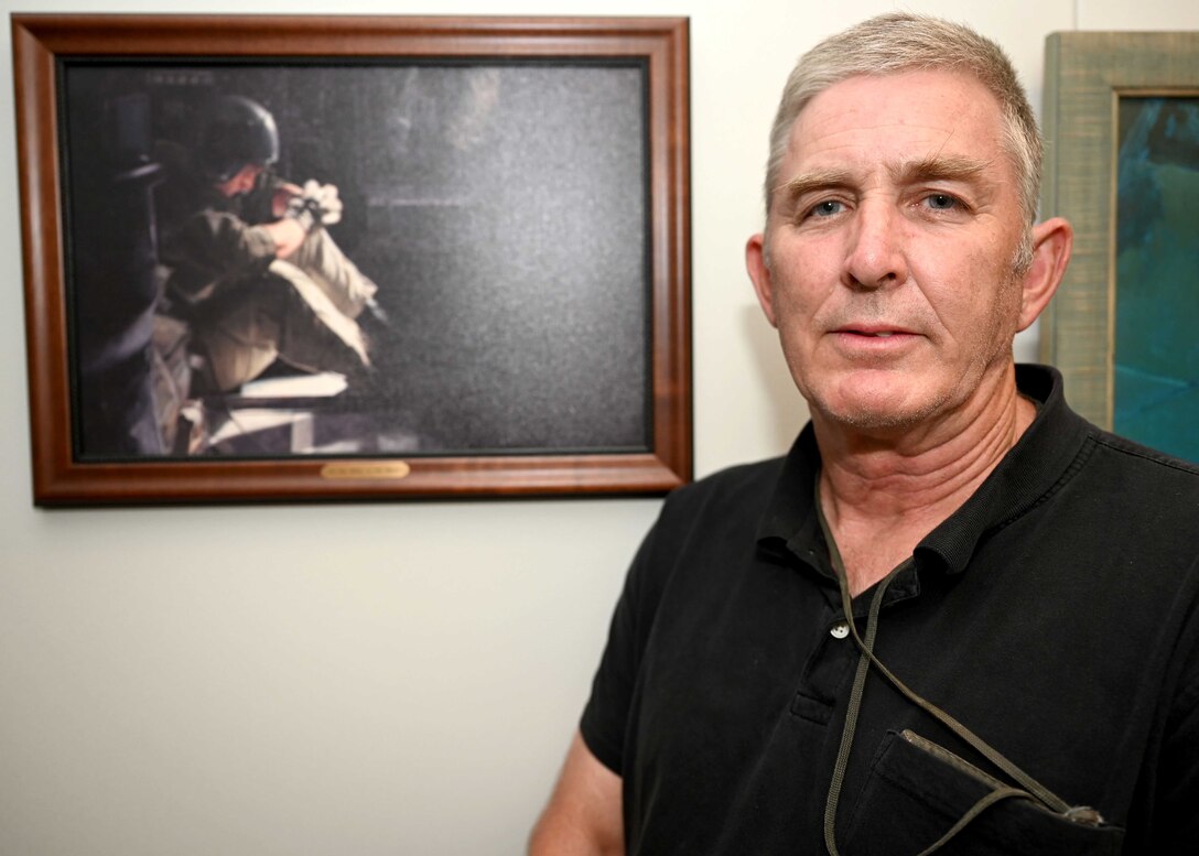 William Walter,  program analyst with Air Force Special Operations Command, AC-130 Requirements, and former AC-130 gunship crew member, poses for a photo Nov. 3, 2020 at Hurlburt Field, Florida. Walter was selected by AFSOC leadership to compete at the Spark Tank Finals in Feb. 2021 for his design of a low-cost alternative training round for AC-130 gunships. (U.S. Air Force photo by Senior Airman Brandon Esau)