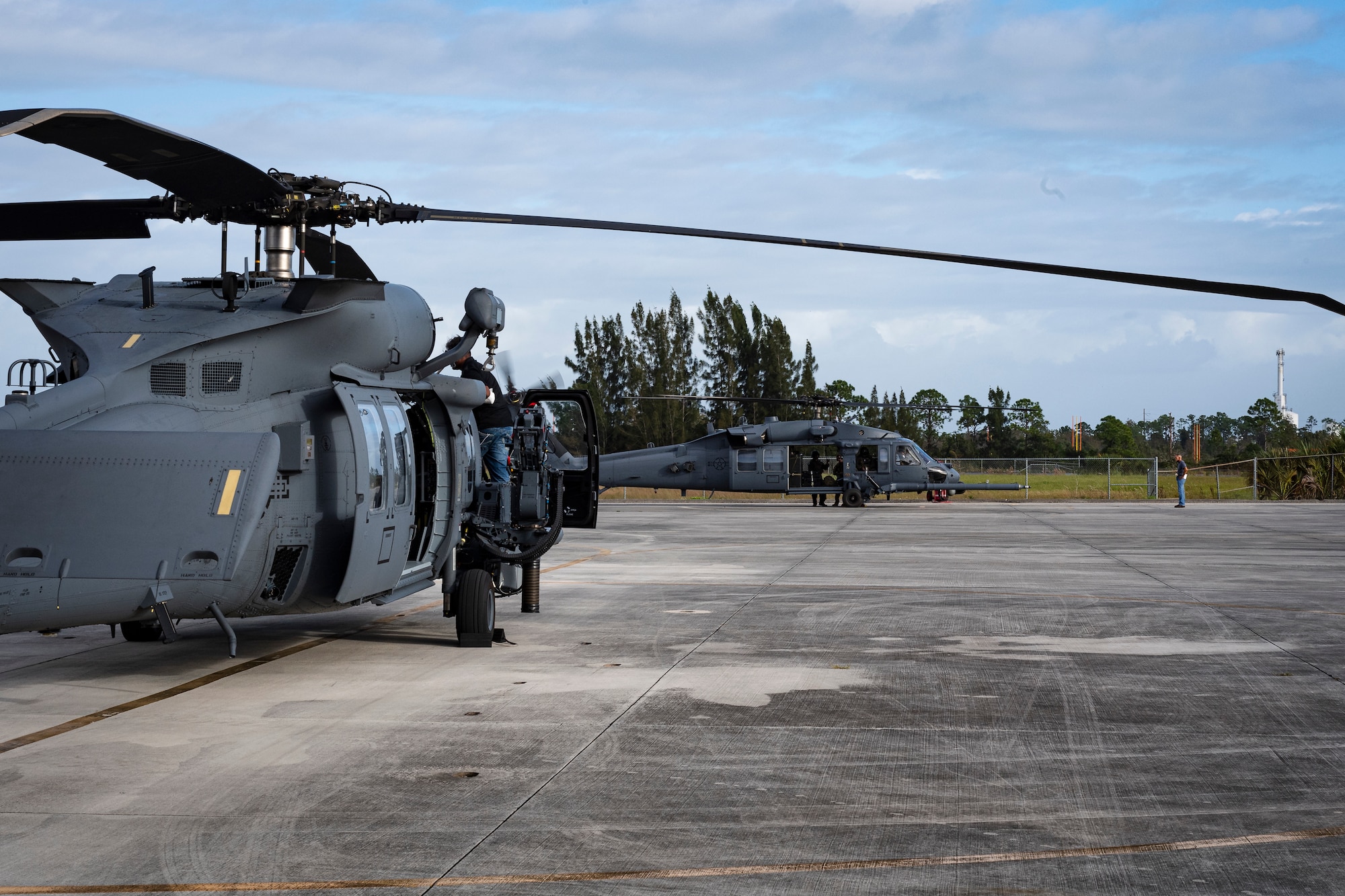 A photo of two helicopters