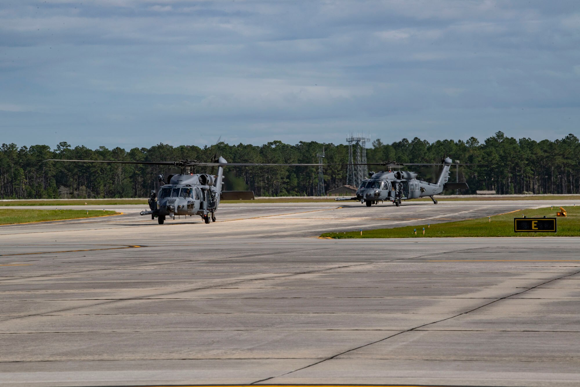 A photo of helicopters taxiing