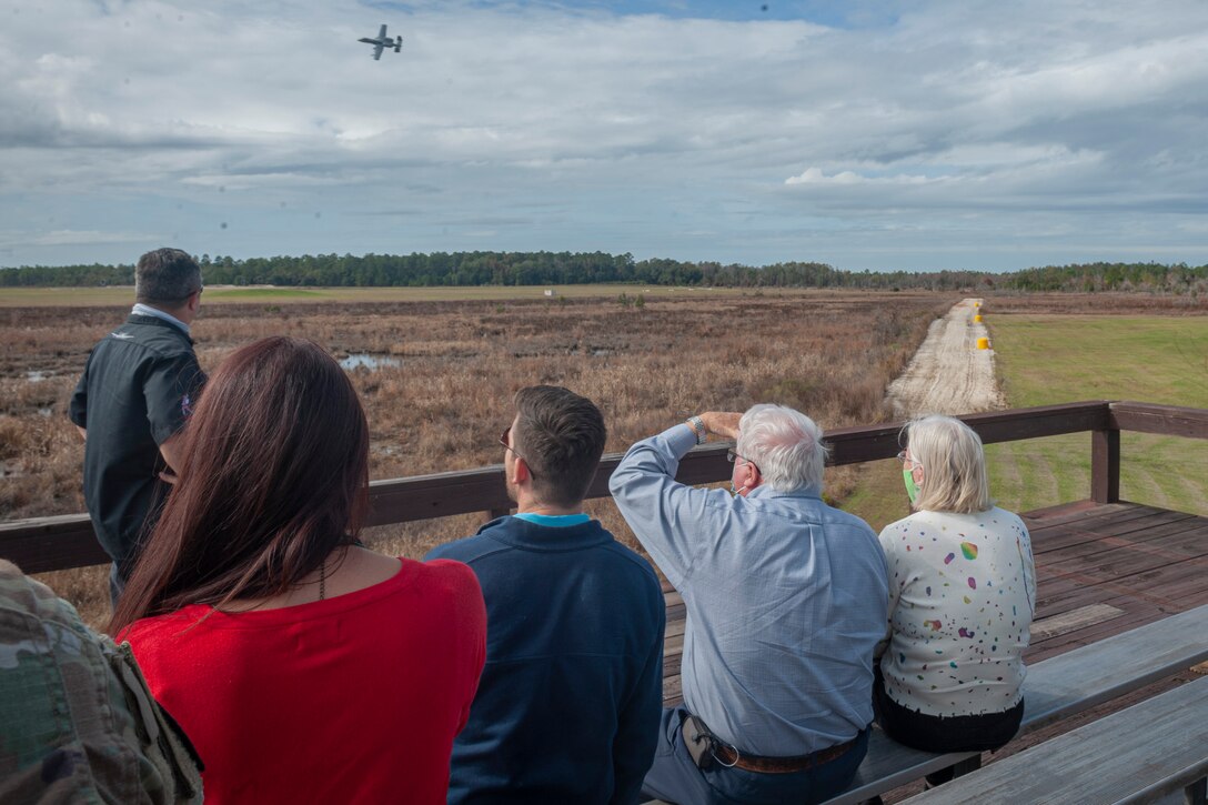 Photo of the Chenault family looking at an A-10C Thunderbolt II