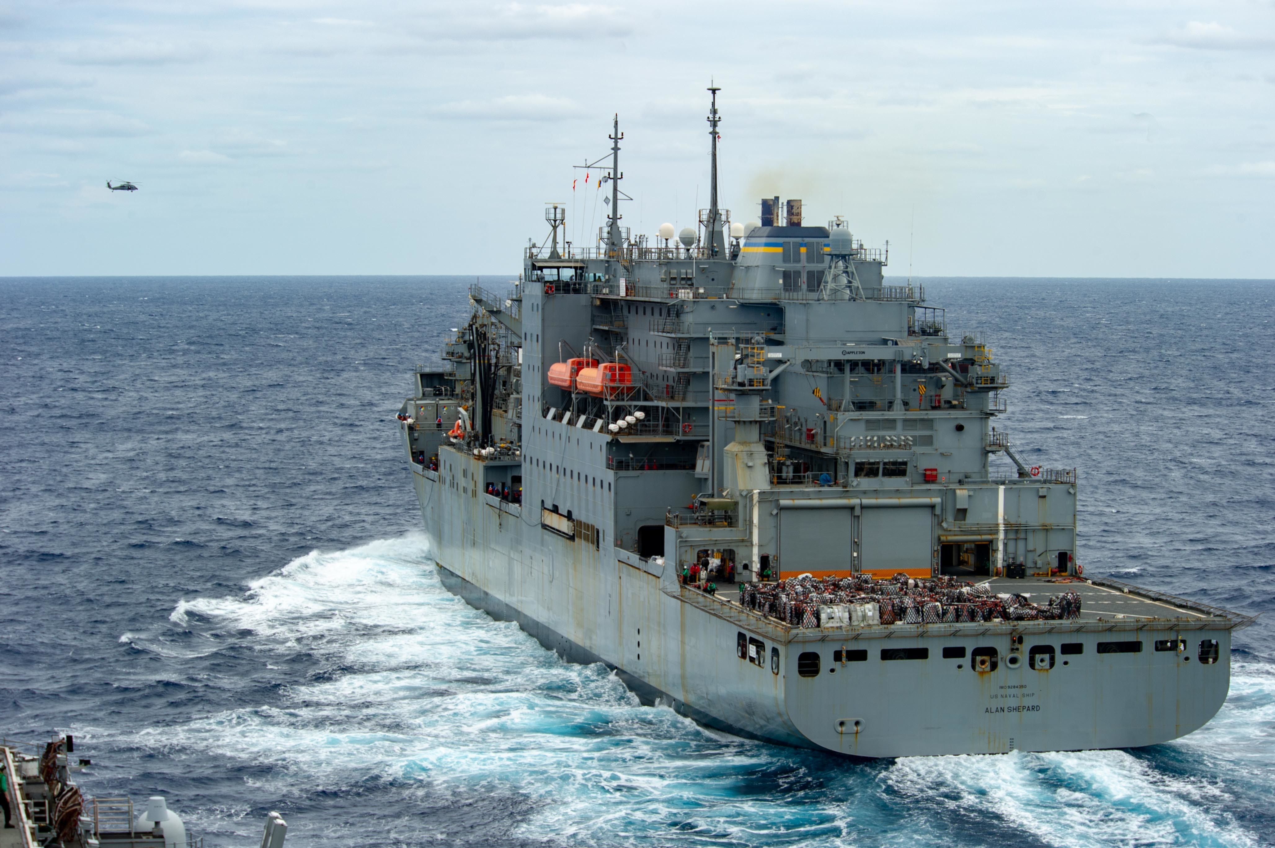 USNS Alan Shepard (T-AKE 3) pulls away from USS Ronald Reagan (CVN 76).