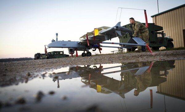 U.S. Army Spc. Christopher Cardwell, Delta Company, 776th Brigade Engineer Battalion, Detachment 1, Unmanned Aircraft Systems maintainer, prepares a RQ-7B Shadow for flight during Bold Quest 20.2 at Camp Atterbury, Indiana, Oct. 30, 2020. Bold Quest is a collaborative joint and multinational enterprise in which Nations, Services and Programs pool their resources in a recurring cycle of capability development, demonstration and analysis. Conceived in 2001, the BQ coalition has grown since 2003 from the U.S. services and four nations to now include 18 Partner Nations and NATO Headquarters.