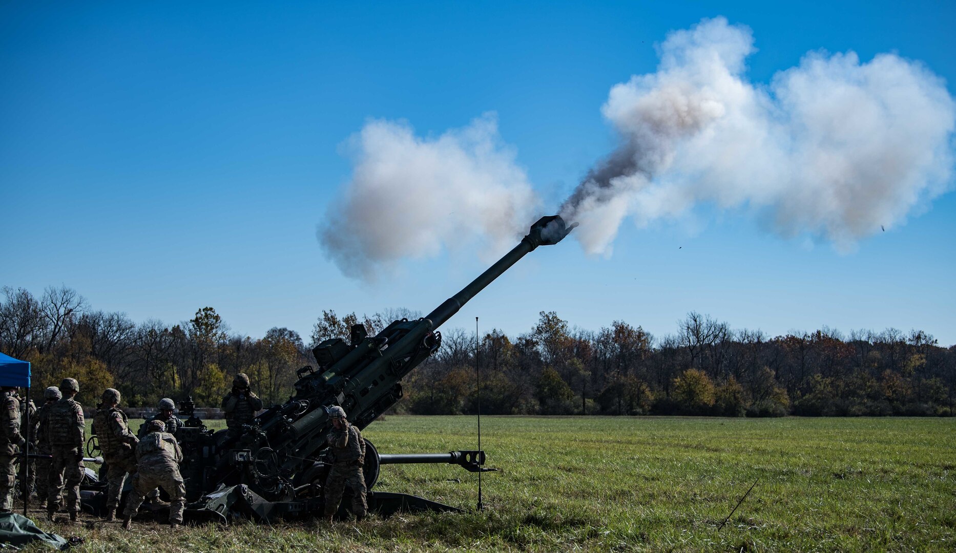 Soldiers with the Indiana Army National Guard conduct a field artillery fire mission during Exercise Bold Quest 20.2 at Camp Atterbury, Indiana, Oct. 31, 2020. Led by the Joint Staff, Bold Quest is a multinational training demonstration to test a joint capability to link sensors to shooters across air, land, sea, space and cyberspace.