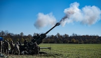 Soldiers with the Indiana Army National Guard conduct a field artillery fire mission during Exercise Bold Quest 20.2 at Camp Atterbury, Indiana, Oct. 31, 2020. Led by the Joint Staff, Bold Quest is a multinational training demonstration to test a joint capability to link sensors to shooters across air, land, sea, space and cyberspace.