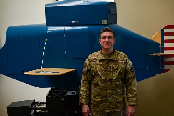 A man stands in uniform