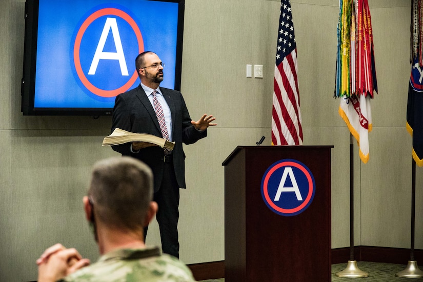 U.S. Army Central command historian, Michael Clauss, speaks to the audience about the history of Third Army during a ceremony honoring USARCENT’s 102nd birthday on Nov.6, 2020 at U.S. Army Central headquarters on Shaw Air Force Base, S.C.