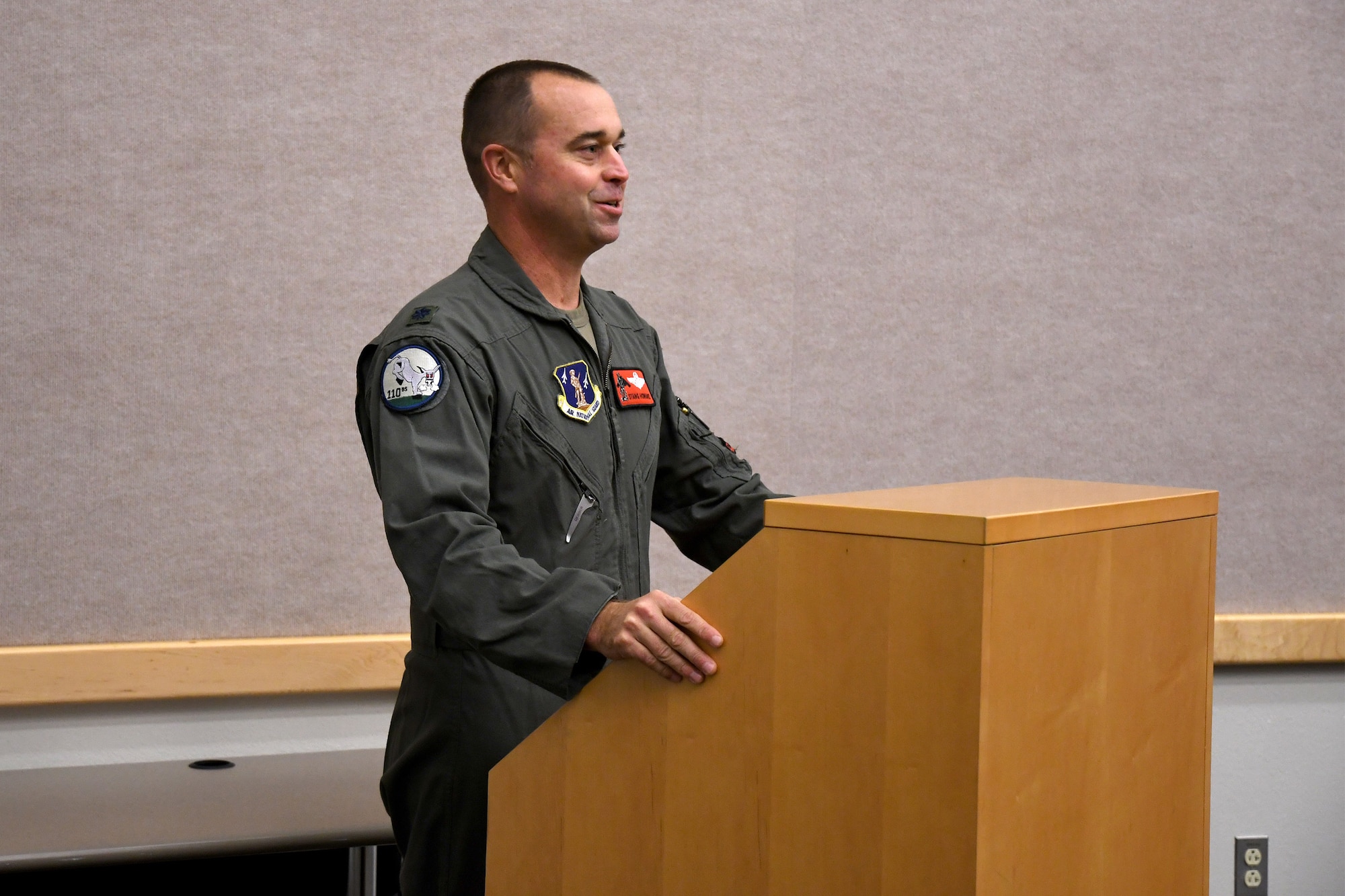 Lt. Col. Matthew Howard delivers his speech during his assumption of command ceremony for the 110th Bomb Squadron, Oct. 24, 2020, at The Technical Sergeant Luke C.A. Ford Auditorium on Whiteman Air Force Base, Mo. (U.S. Air National Guard photo by Staff Sgt. Joshua Colligan)