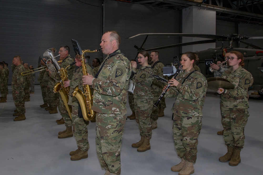 The 40th Army Band, Garrison Support Command, Vermont National Guard, plays the national anthem during a change of command ceremony.