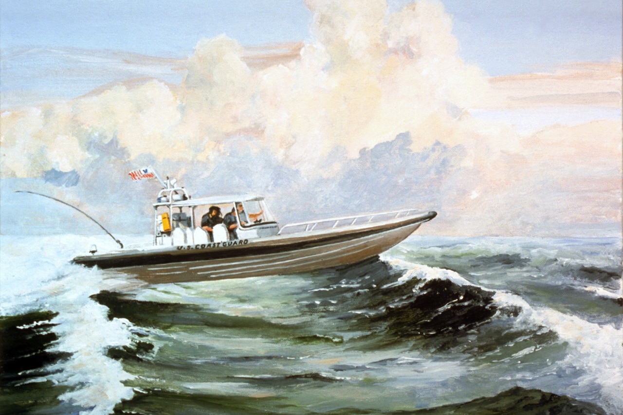 A Coast Guard vessel cruises the ocean.