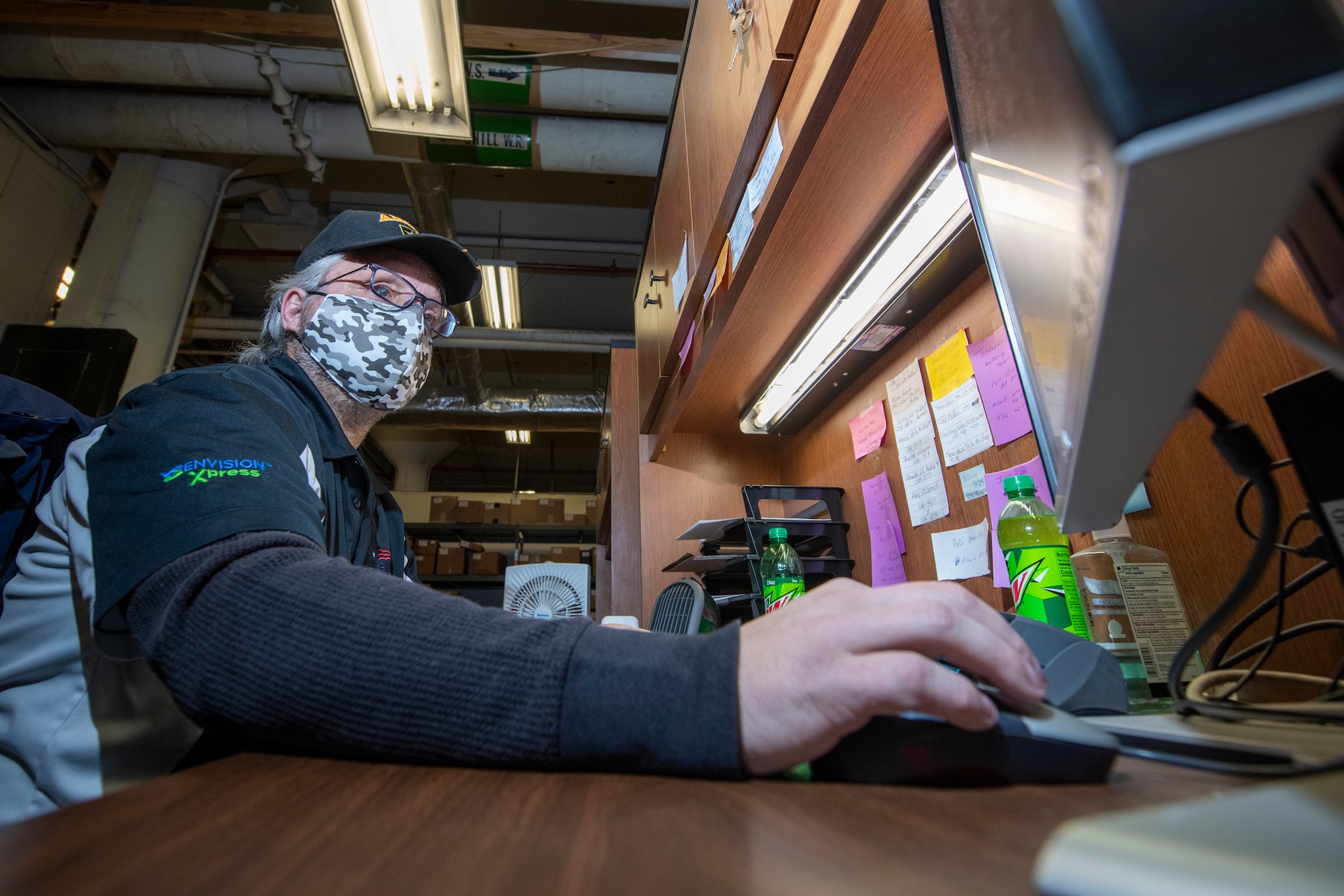 man sits at computer