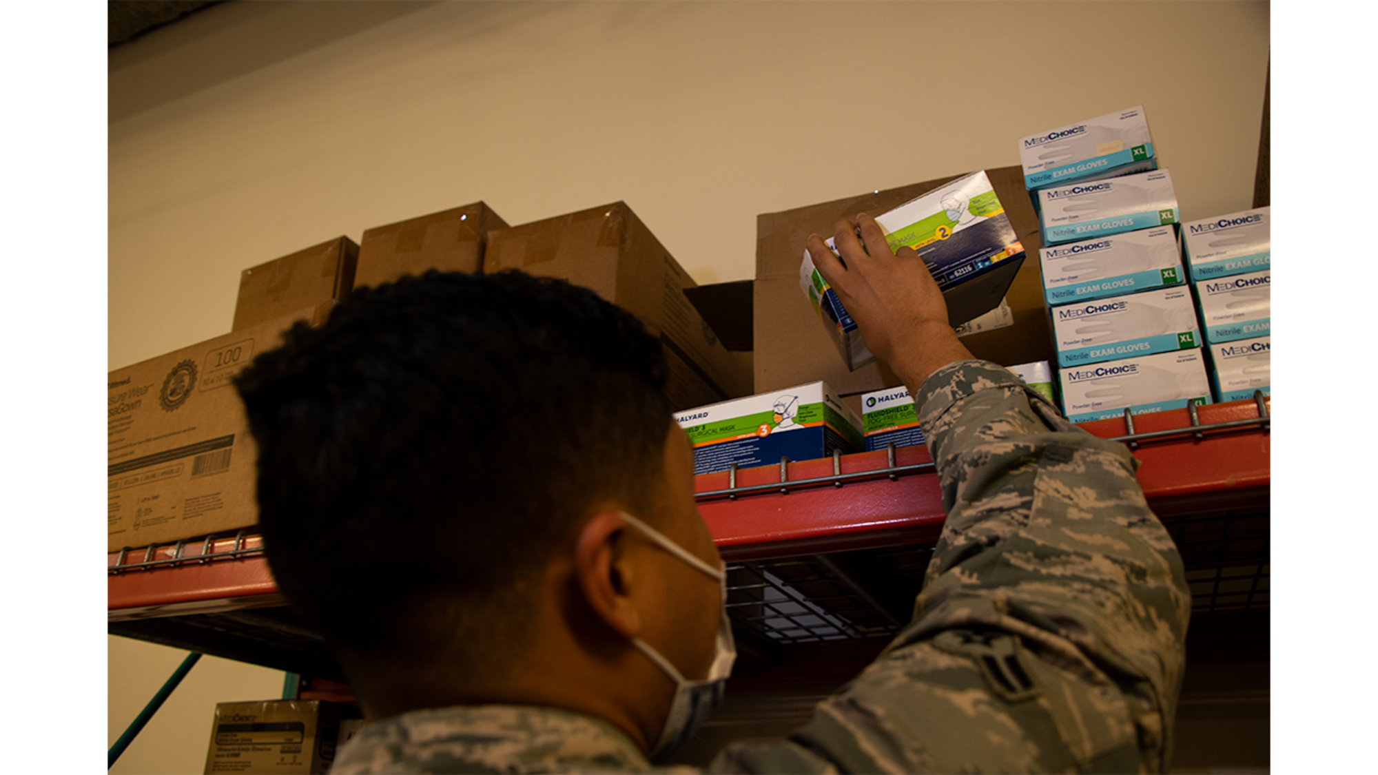 Airman 1st Class Yobanni Calderon, 42nd Medical Materiel professional, restocks personal protection equipment at the 42 MDG, November, 6, 2020. Calderon ensures availability of PPE for all MDG staff. The efforts of Calderon permit the MDG mission to continue during the current COVID-19 environment.(U.S. Air Force photo by Airman 1st Class Jackson Manske.)