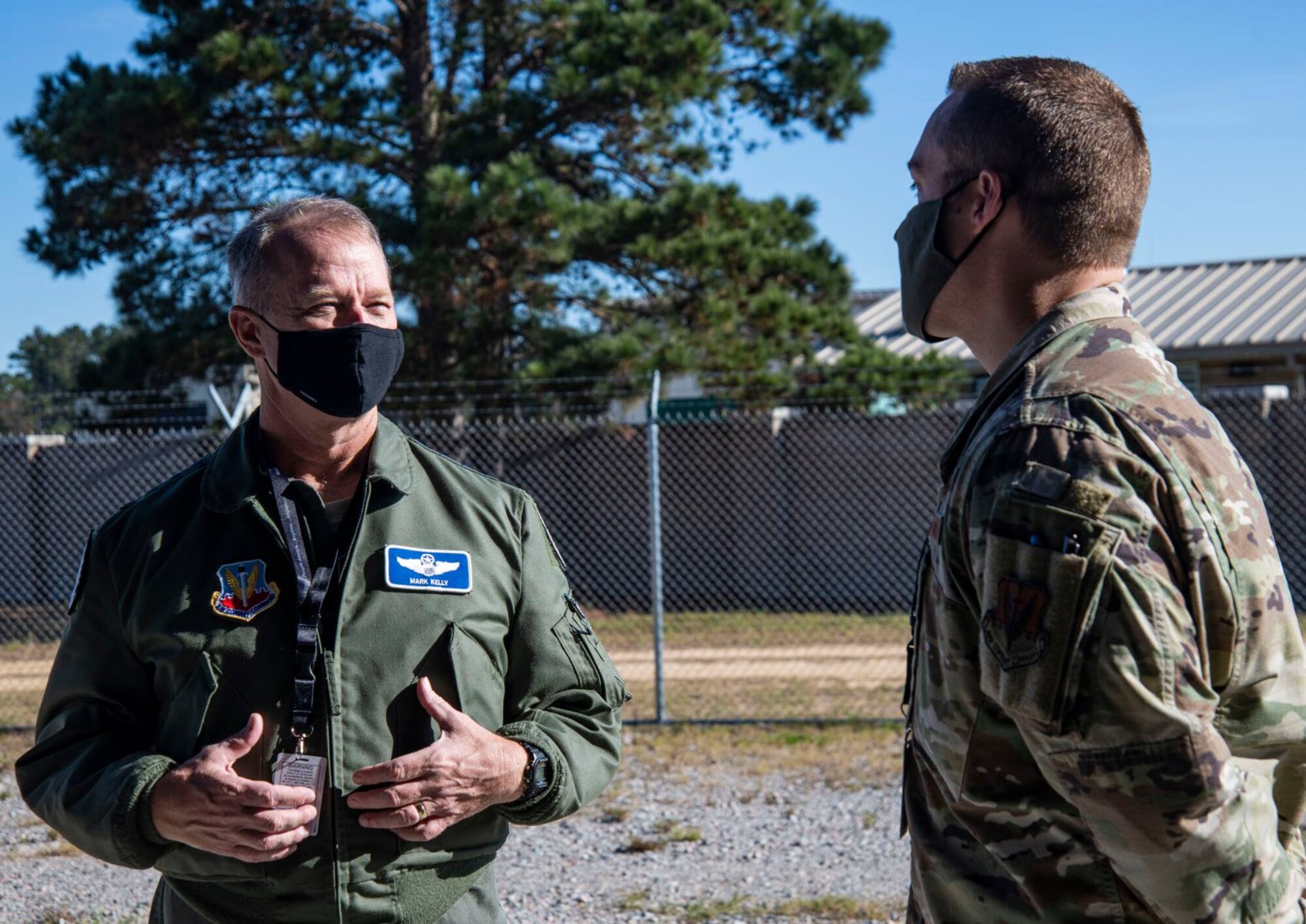 A photo of a General and an Airman.