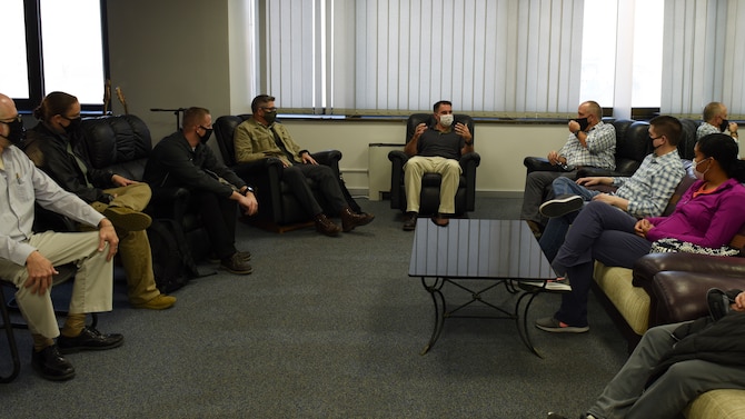 people sitting in a conference room
