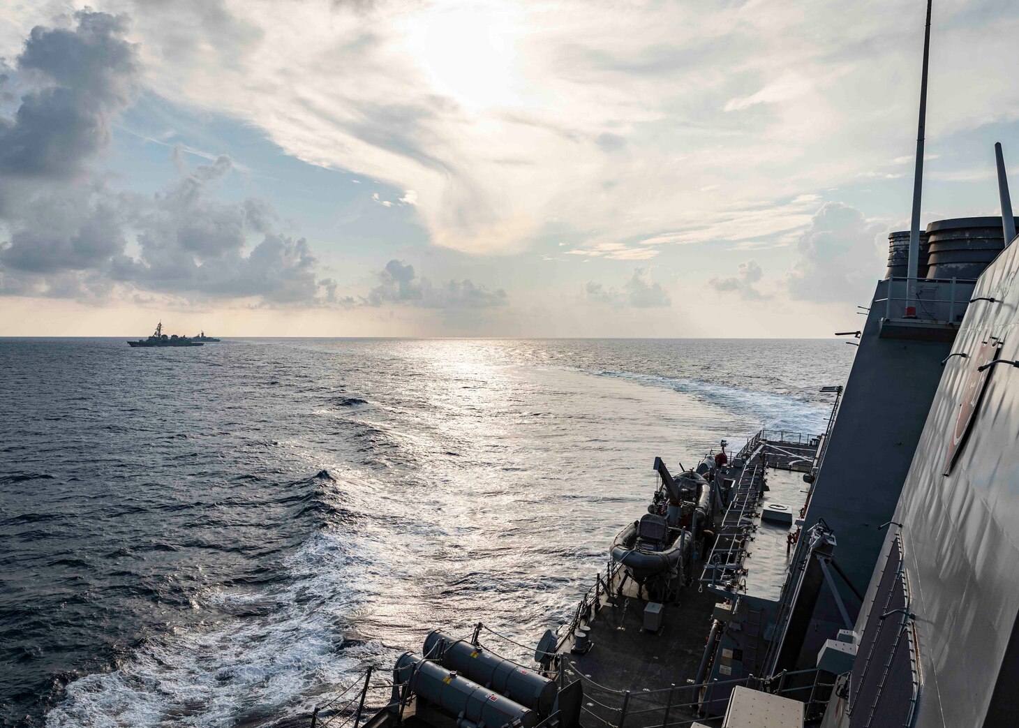 The Arleigh Burke-class guided-missile destroyer USS John S. McCain (DDG 56) performs divisional tactics with the Royal Australian Navy Anzac-class frigate HMAS Ballarat (FFH 155) and the Takanami-class destroyer JS Oonami (JS 111) while conducting integrated operations. McCain is assigned to Destroyer Squadron Fifteen (DESRON 15), the Navy’s largest forward-deployed DESRON and the U.S. 7th Fleet’s principal surface force.