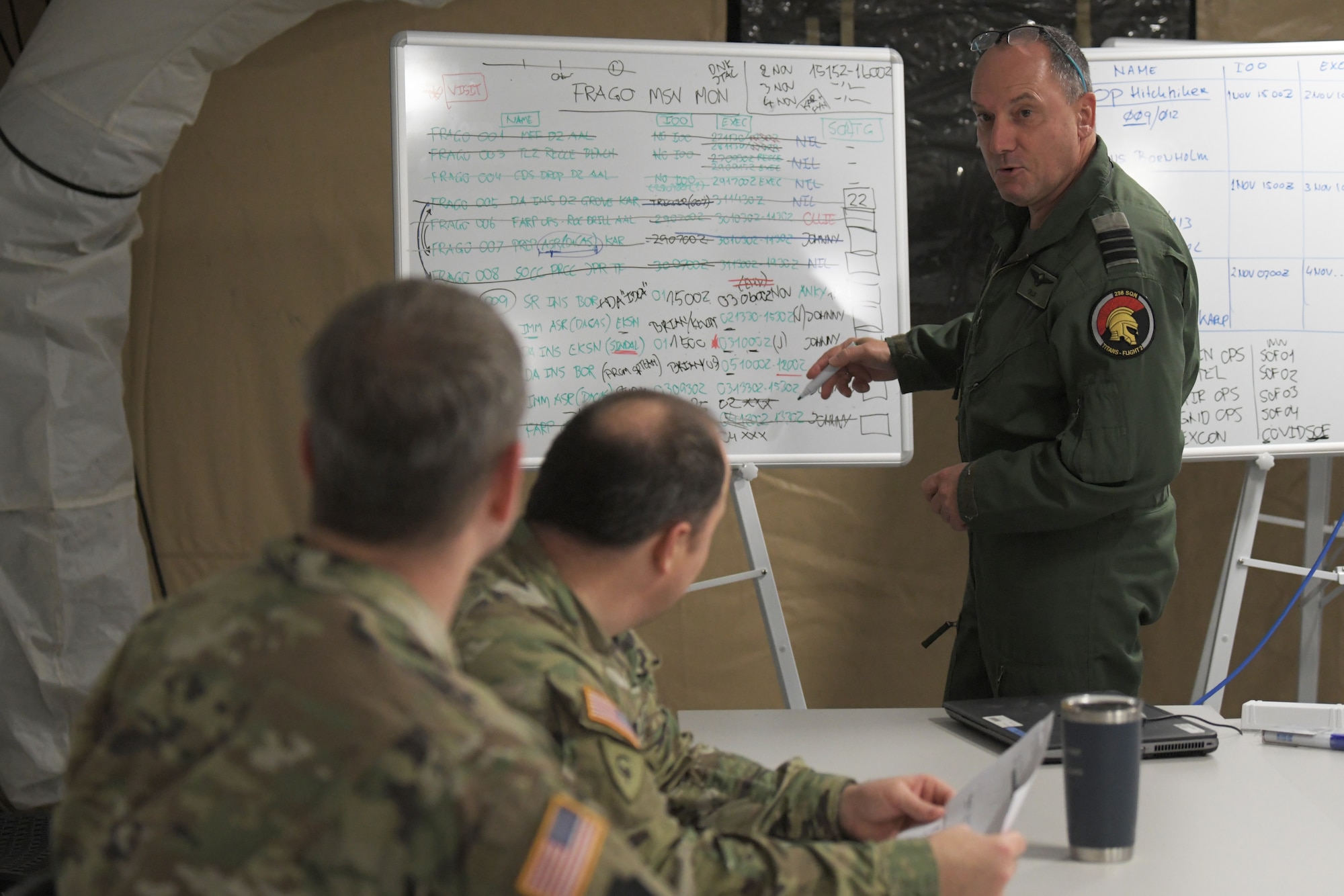 Participants of a combined readiness exercise in the Baltic region conduct a mission briefing at Aalborg Air Base, Denmark, Oct. 31, 2020. The exercise enhances the proficiency of multinational forces to counter military aggression and coercion by sharing responsibilities for common defense. (U.S. Air Force photo by Senior Airman Shanice Ship)