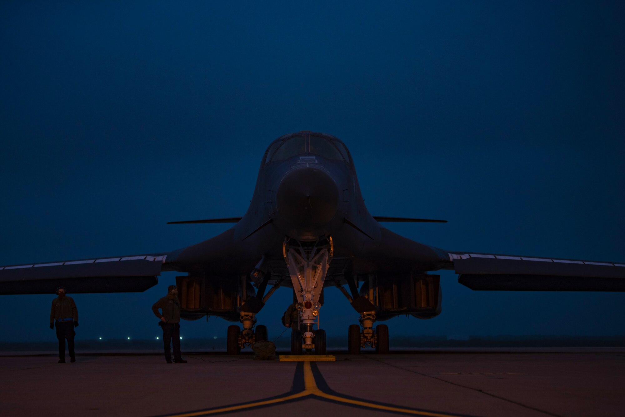 Airman 1st Class Andrew Thomas, 7th Aircraft Maintenance Squadron crew chief, left, and Staff Sgt. Eric Kosecki, 7th AMXS crew chief, prepare to do preflight inspections on a B-1B Lancer at Dyess Air Force Base, Texas, Oct. 19, 2020. Airmen assigned to the 7th Bomb Wing deployed in support of a Bomber Task Force operation in Andersen AFB, Guam. (U.S. Air Force photo by Airman 1st Class Colin Hollowell)