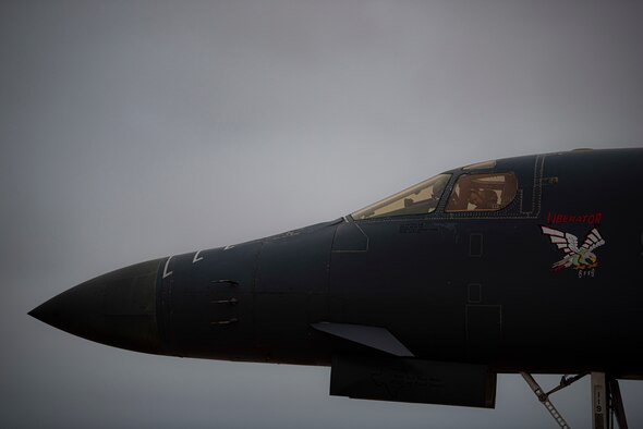Airman 1st Class Andrew Thomas, 7th Aircraft Maintenance Squadron crew chief, left, and Staff Sgt. Eric Kosecki, 7th AMXS crew chief, prepare to do preflight inspections on a B-1B Lancer at Dyess Air Force Base, Texas, Oct. 19, 2020. Airmen assigned to the 7th Bomb Wing deployed in support of a Bomber Task Force operation in Andersen AFB, Guam. (U.S. Air Force photo by Airman 1st Class Colin Hollowell)