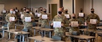 U.S. Army officers and noncommissioned officers from the Georgia Army National Guard proudly show their diplomas after graduating from Company Command Pre-Command Course at Clay National Guard Center in Marietta, Georgia, Oct. 30, 2020. The five-day leadership course trained company command teams on systems and services to effectively lead their formations.