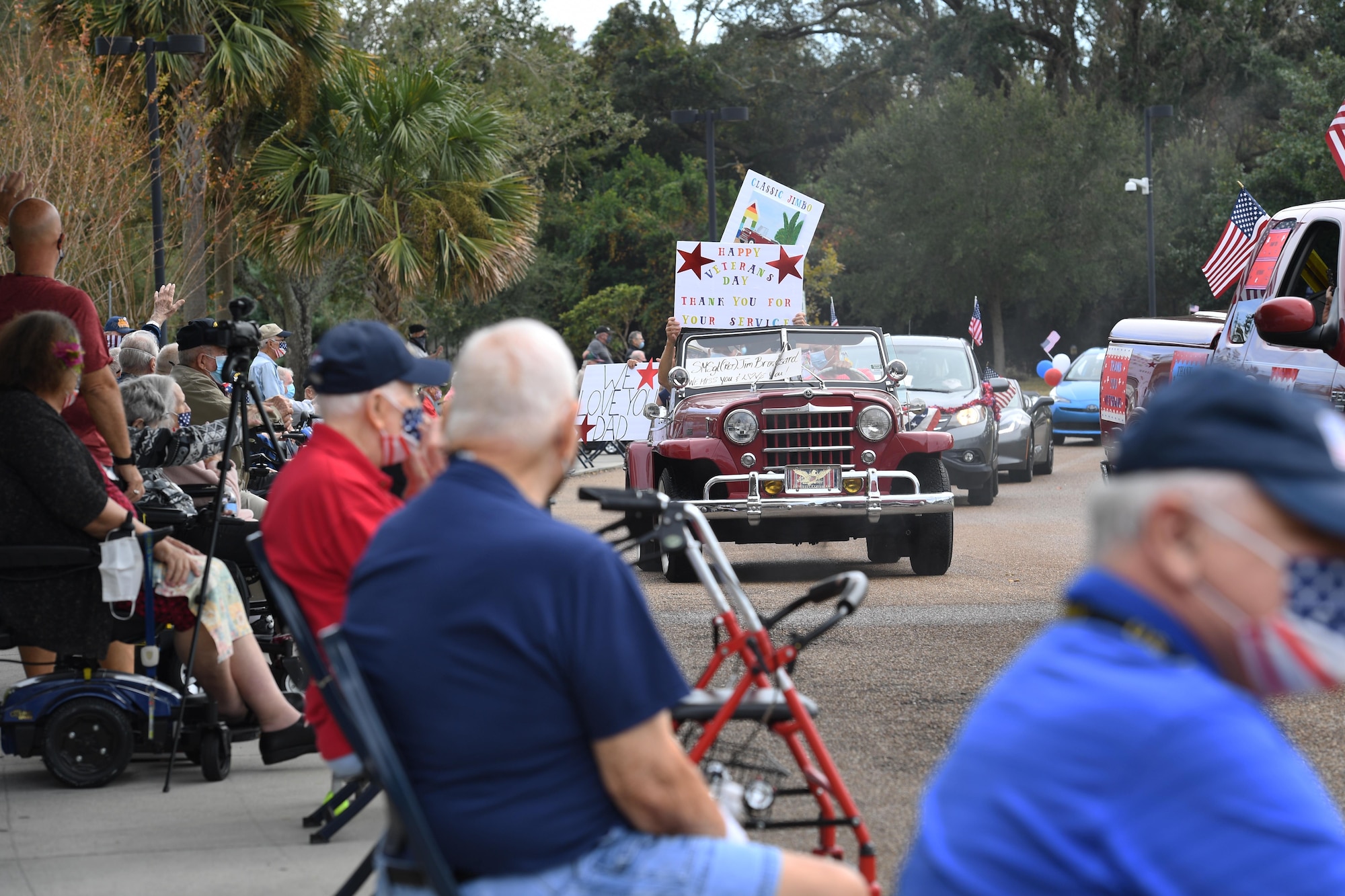 Gulf Coast veterans participate in the Gulf Coast Veteran's Day Roll-Thru and Wave Parade outside the Armed Forces Retirement Home at Gulfport, Mississippi, Nov. 7, 2020. Keesler Air Force Base leadership participated in the parade in support of all veterans past and present. (U.S. Air Force photo by Kemberly Groue)