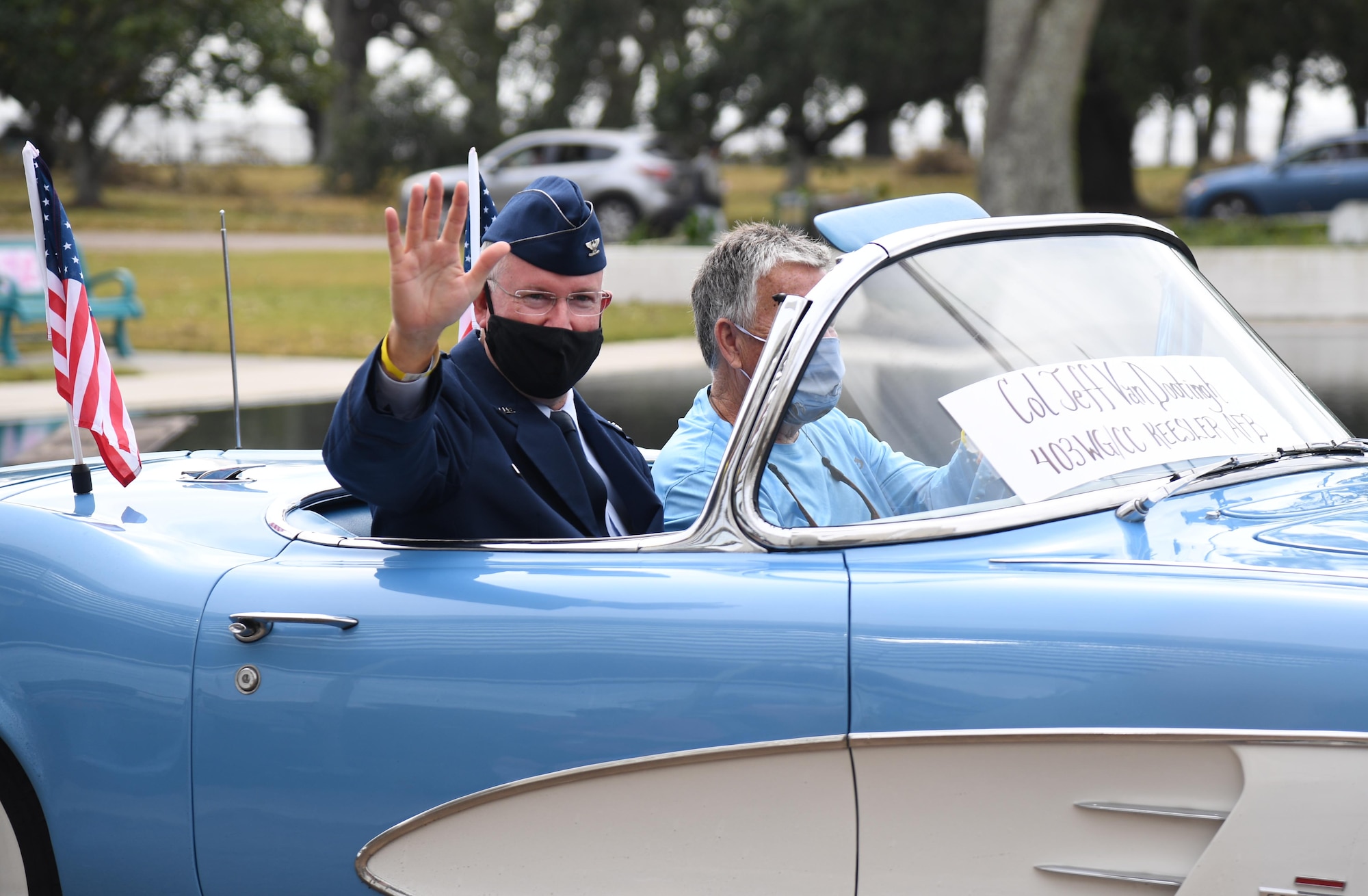 U.S. Air Force Col. Jeff Van Dootingh, 403rd Wing commander, waves to veterans during the Gulf Coast Veteran's Day Roll-Thru and Wave Parade outside the Armed Forces Retirement Home at Gulfport, Mississippi, Nov. 7, 2020. Keesler Air Force Base leadership participated in the parade in support of all veterans past and present. (U.S. Air Force photo by Kemberly Groue)