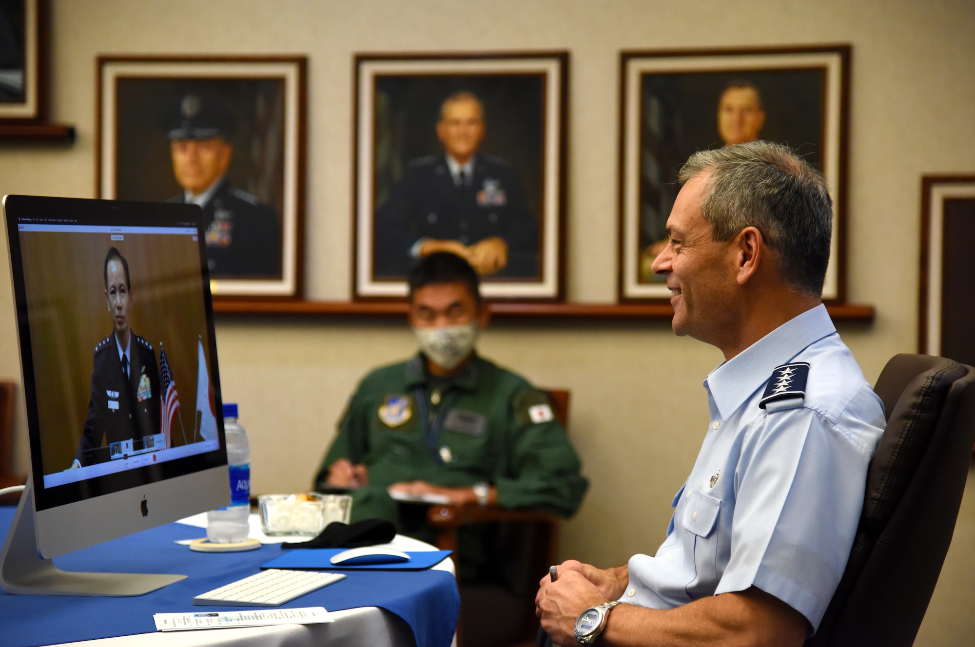 U.S. Air Force Gen. Ken Wilsbach, Pacific Air Forces (PACAF) commander, speaks with Gen Shunji Izutsu, Koku-Jieitai (Japan Air Self-Defense Force) Chief of Staff, during a virtual engagement, at Hickam AFB, HI, Nov. 4, 2020. The virtual engagement provided Wilsbach and Izutsu an opportunity to discuss Koku-Jieitai-PACAF operational priorities, the ongoing COVID-19 pandemic, and appreciation for the partnership and alliance between the U.S. and Japan. (U.S. Air Force photo by Master Sgt. Miguel Lara III)