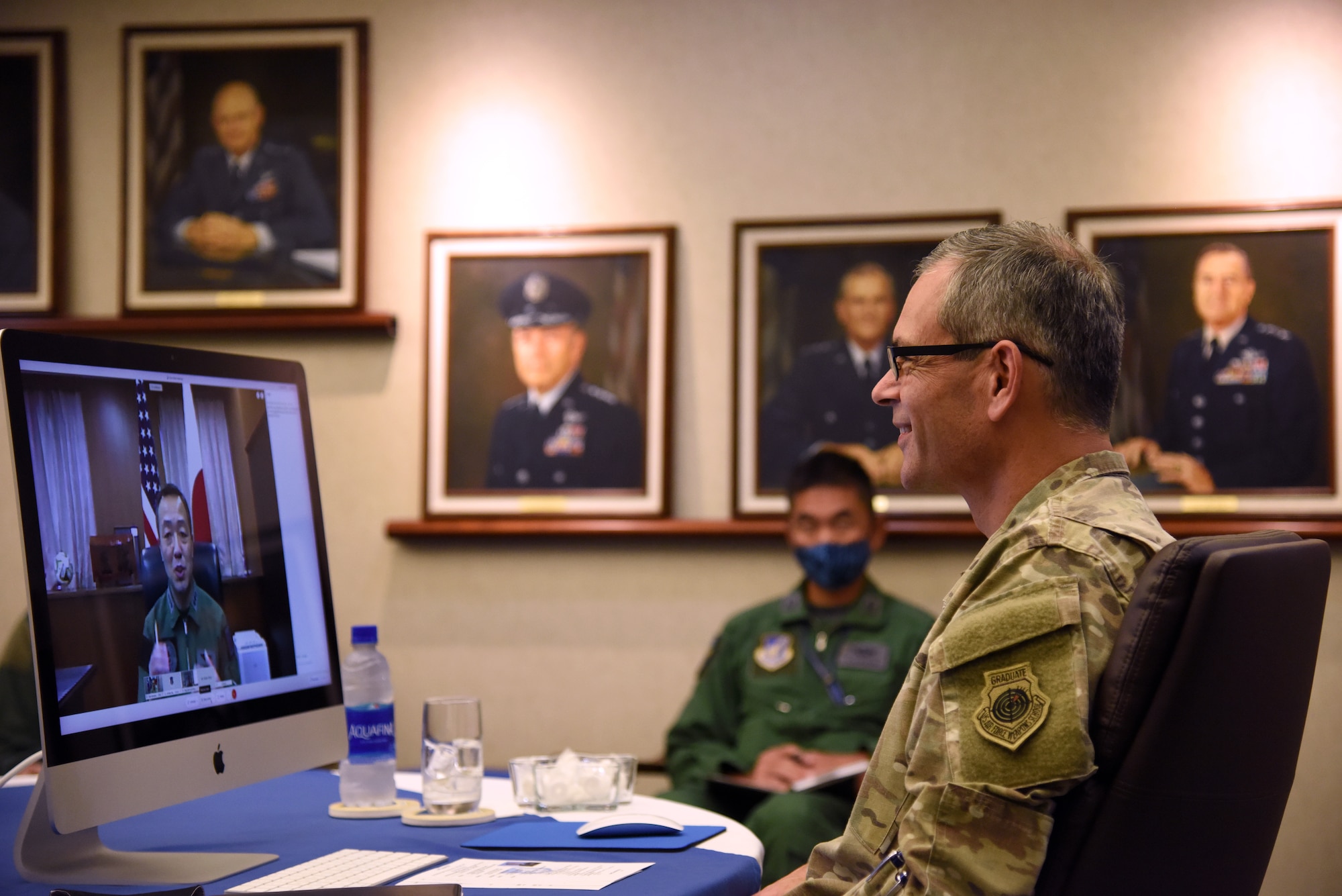 U.S. Air Force Gen. Ken Wilsbach, Pacific Air Forces (PACAF) commander, speaks with Lt Gen Hiroaki Uchikura, Japan Air Self-Defense Force (JASDF)(Koku-Jieitai) Air Defense Command commander, during a virtual engagement, at Joint Base Pearl Harbor-Hickam, HI, Nov. 3, 2020. The virtual engagement provided Wilsbach and Uchikura an opportunity to discuss Koku-Jieitai-PACAF operational priorities, the ongoing COVID-19 pandemic, and appreciation for the partnership and alliance between the U.S. and Japan. (U.S. Air Force photo by Master Sgt. Miguel Lara III)