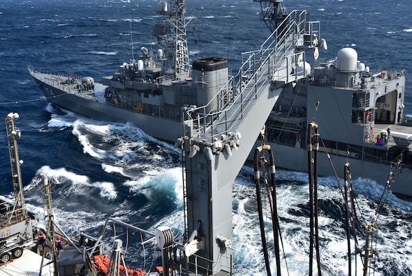 The Japan Maritime Self-Defense Force Asagiri-class destroyer JS Amagiri (DD 154) receives fuel from the U.S. Navy Military Sealift Command Henry J. Kaiser-class fleet replenishment oiler USNS Tippecanoe (T-AO 199) during Keen Sword.