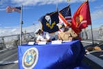 Rear Adm. Don Gabrielson and Brig. Gen. Phillip Frietze, sign the Joint Maritime Component Commander Maritime Campaign Support Plan in a ceremony aboard USS Wichita (LCS 13), Nov. 4.
