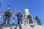 YOKOSUKA, Japan (Nov. 10, 2020) - Sailors man the rails as the Ticonderoga-class guided-missile cruiser USS Antietam (CG 54) returns to Yokosuka, Japan. Antietam’s return marked the end of a nine-month deployment in the U.S. 7th Fleet area of responsibility in support of security and stability in the Indo-Pacific.