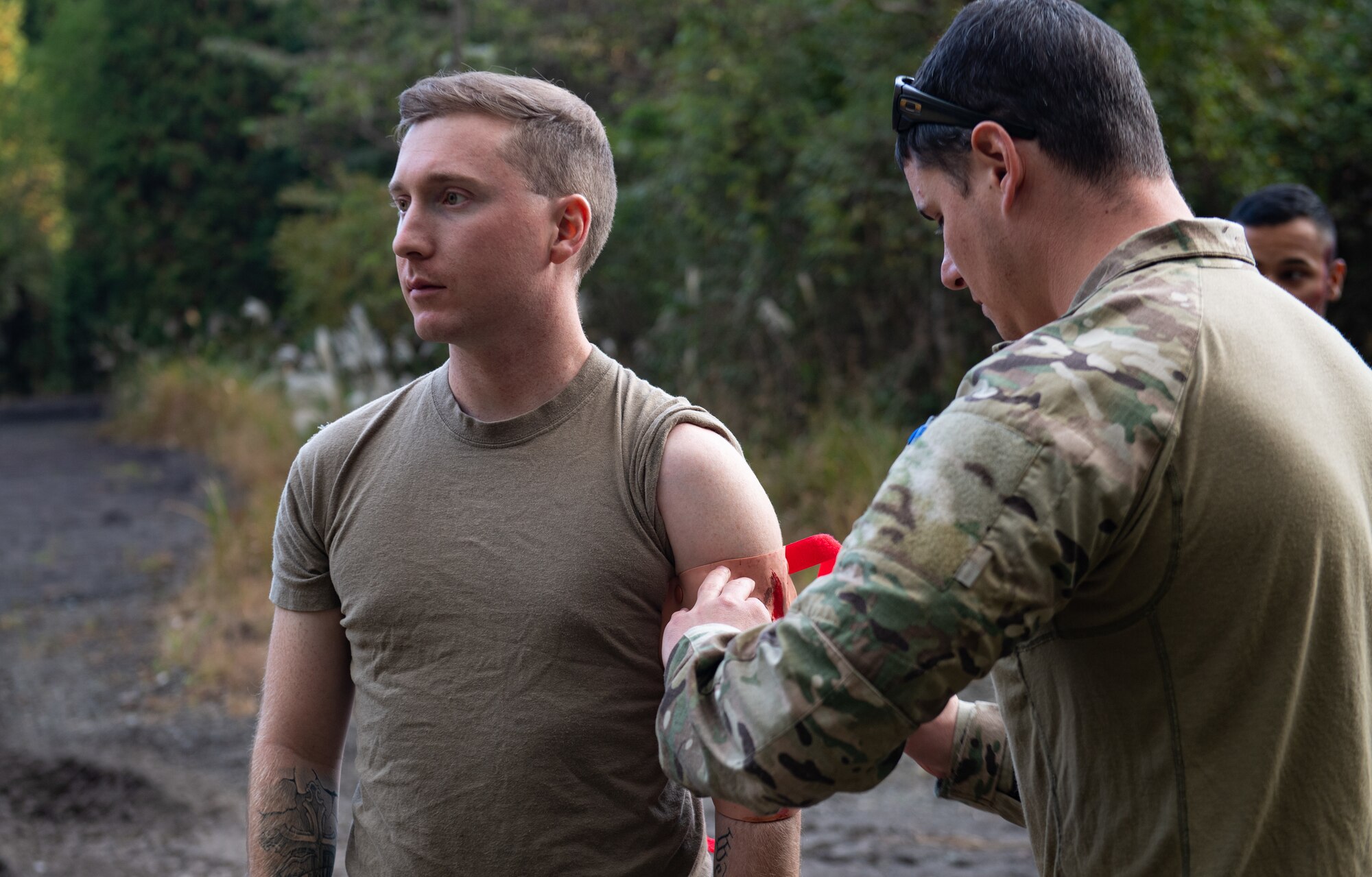 Tech. Sgt. Ryan Springer, 320th Special Tactics Squadron independent duty medical technician, applies a simulated wound