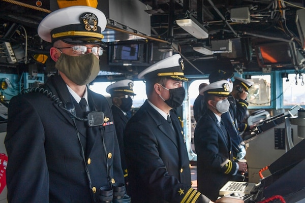 YOKOSUKA, Japan (Nov. 10, 2020) - The bridge team aboard the Ticonderoga-class guided-missile cruiser USS Antietam (CG 54) stand watch as Antietam returns to Yokosuka, Japan. Antietam’s return marked the end of a nine-month deployment in the U.S. 7th Fleet area of responsibility in support of security and stability in the Indo-Pacific.