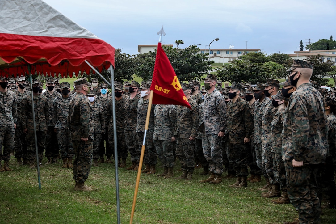 A U.S. Marine leads Marines in singing “The Marines’ Hymn” in celebration of the Marine Corps’ 245th birthday on Camp Kinser, Okinawa, Japan, Nov. 9.