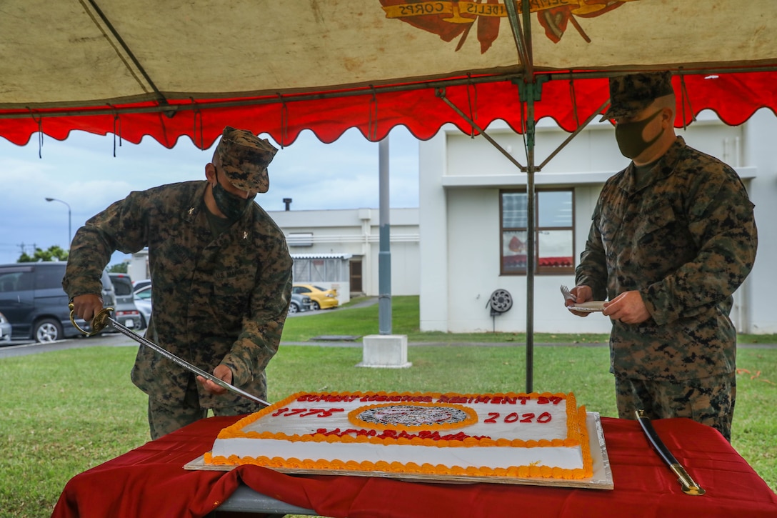 U.S. Marines cut the cake during a cake-cutting ceremony in celebration of the Marine Corps’ 245th birthday on Camp Kinser, Okinawa, Japan, Nov. 9.