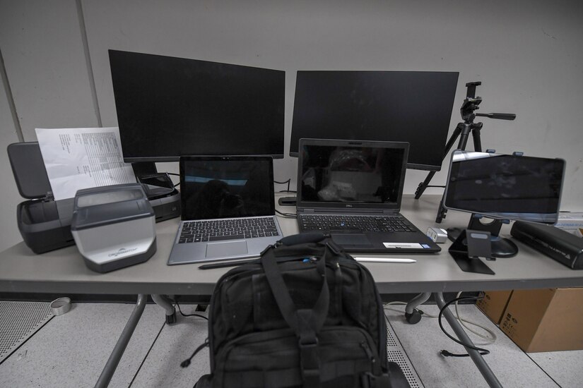 a group of computer equipment sits on a table.