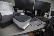 a group of computer equipment sits on a table.