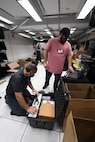 a group of computer equipment sits on a table.