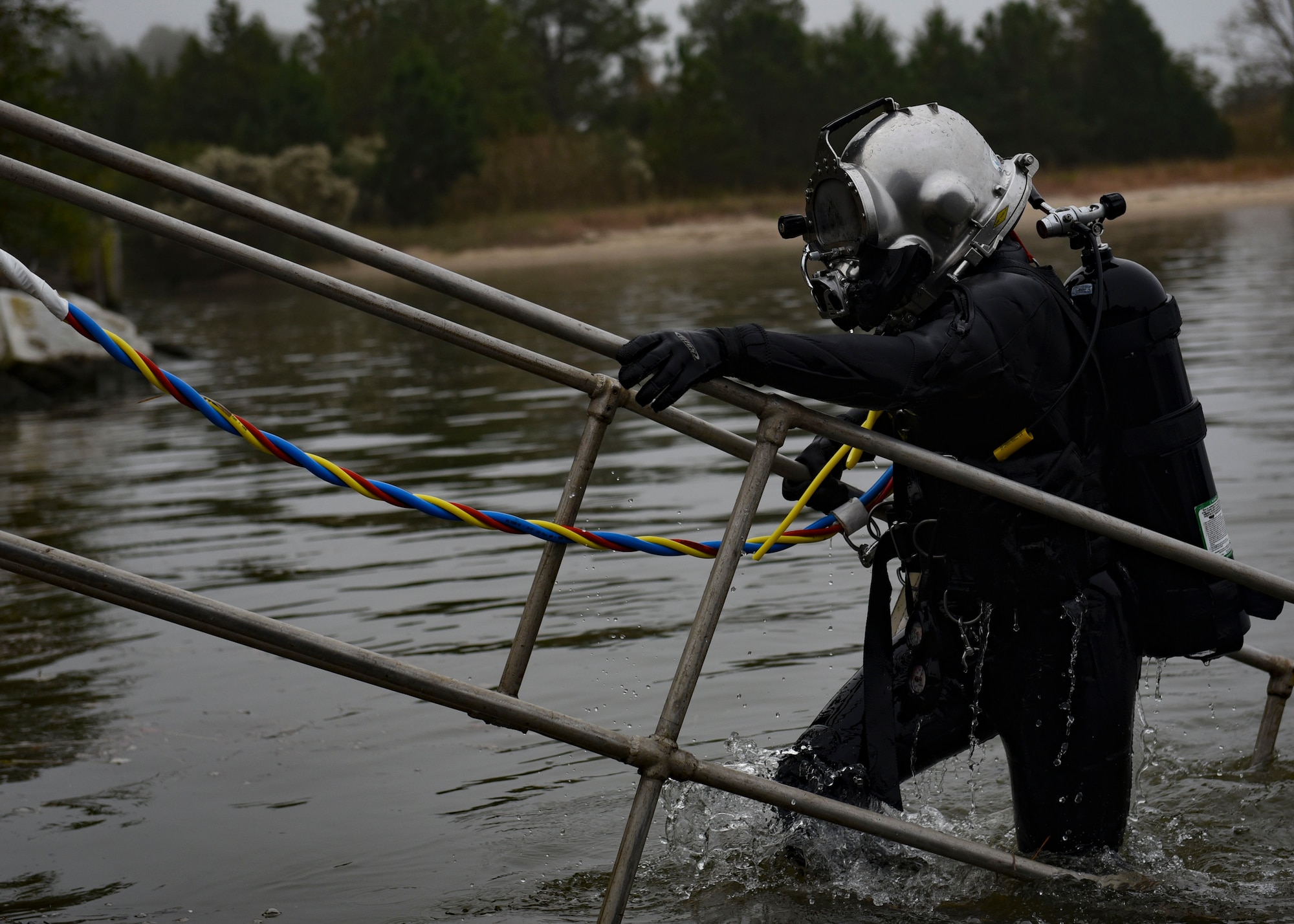 Soldier emerging from water