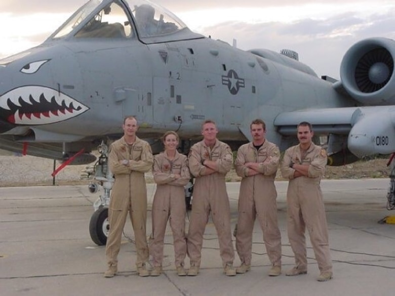 Col. Kim Campbell poses with other 1997 Academy graduates in Afghanistan. Campbell is the Director of the Center for Character and Leadership Development.