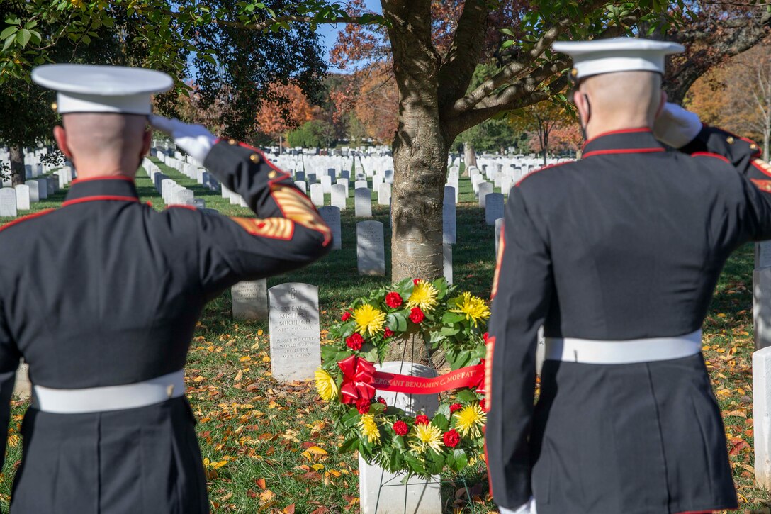 The 19th Sergeant Major of the Marine Corps, Sgt. Maj. Troy E. Black and the Marine Barracks Washington Sergeant Major, Sgt. Maj. Adrian Tagliere, pay tribute to Pvt. Robert Maulding at the Arlington National Cemetery following the Marine Corps Birthday Wreath Laying Ceremony, Arlington Va., Nov. 10, 2020. Maulding was chosen in honor of the 75th anniversary of World War II. Maulding was one of the first enlisted killed in action during the war. (U.S. Marine Corps photo by Sgt. Victoria Ross)