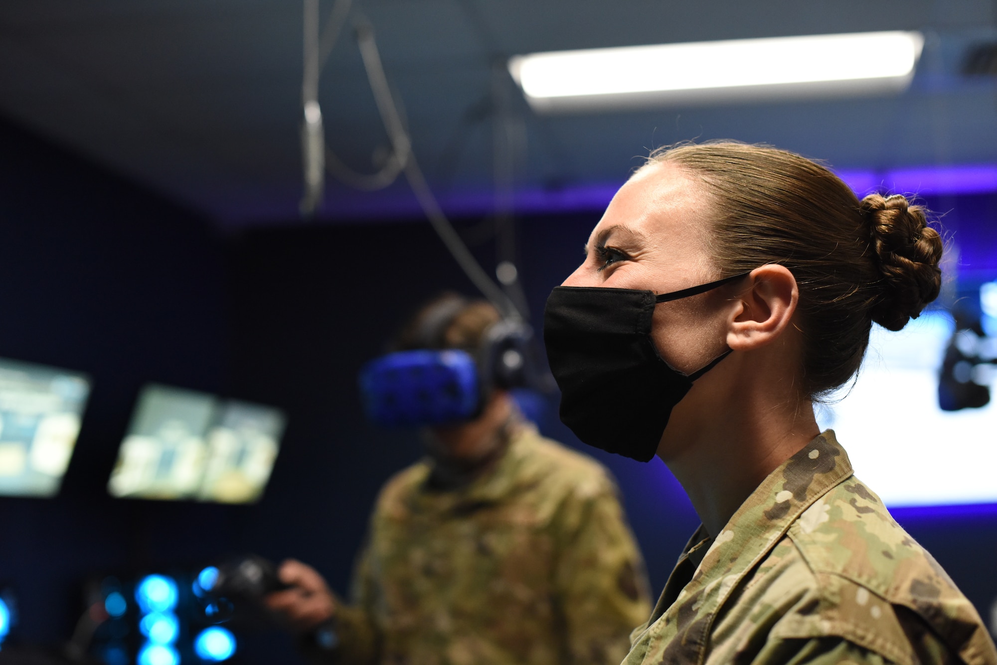 C-130 maintenance instructor watches student's virtual reality training session