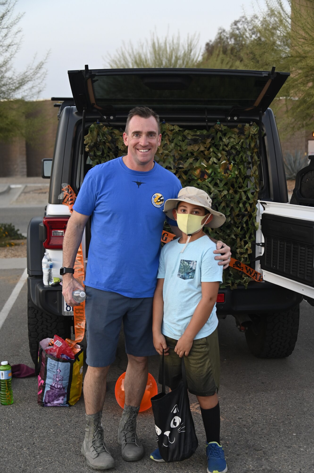 Airmen of the 144th Fighter Wing and their families attend a trunk-or-treat hosted at the Fresno Air National Guard base Oct. 23.