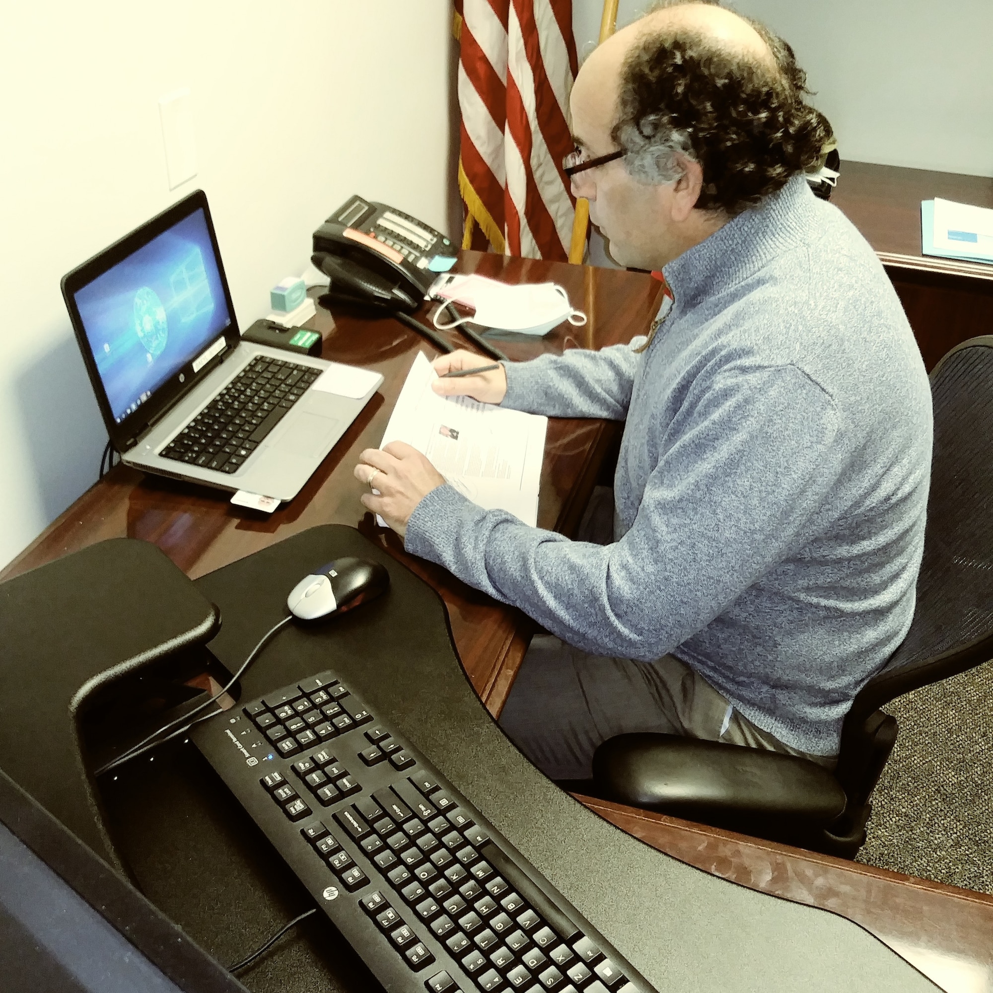 Chief Proietti conversing on the Zoom video conferencing platform to instruct and interact with Citizen Reserve Airmen.