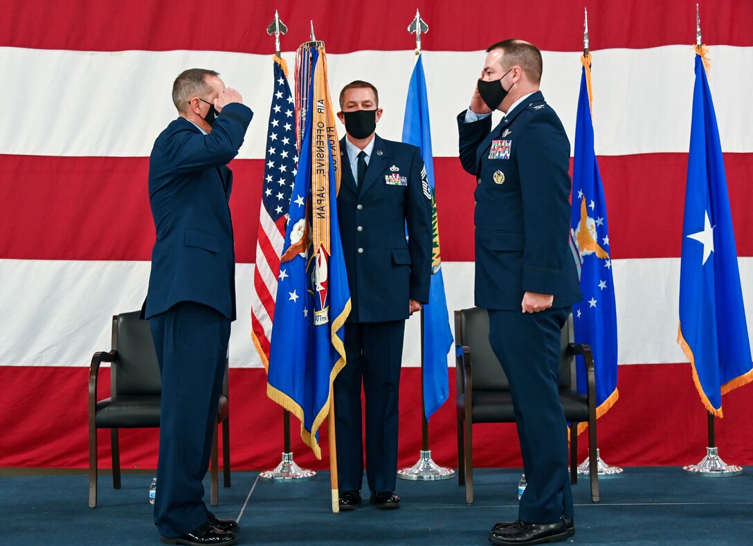 Col. Michael Parks, 507th Air Refueling Wing commander, accepts command of the 507th ARW from Brig. Gen. Jeffrey Pennington, 4th Air Force commander, during a change of command ceremony Nov. 8, 2020, at Tinker Air Force Base, Oklahoma. (U.S. Air Force photo by Senior Airman Mary Begy)