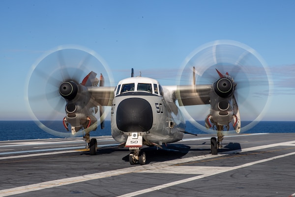A C-2A Greyhound, attached to the "Rawhides" of Fleet Logistics Support Squadron (VRC) 40 taxis aboard USS Gerald R. Ford's (CVN 78) flight deck Nov. 8, 2020